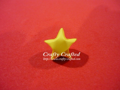 And your lovely little lucky star is all done. Make dozens of it and keep them in a cute little jar. Present it to your loved ones. It's a nice little gift. :)